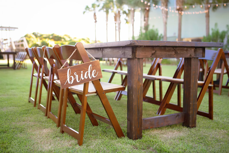 bride's seat at table for wedding reception in sea grove beach. 30a wedding photographer.