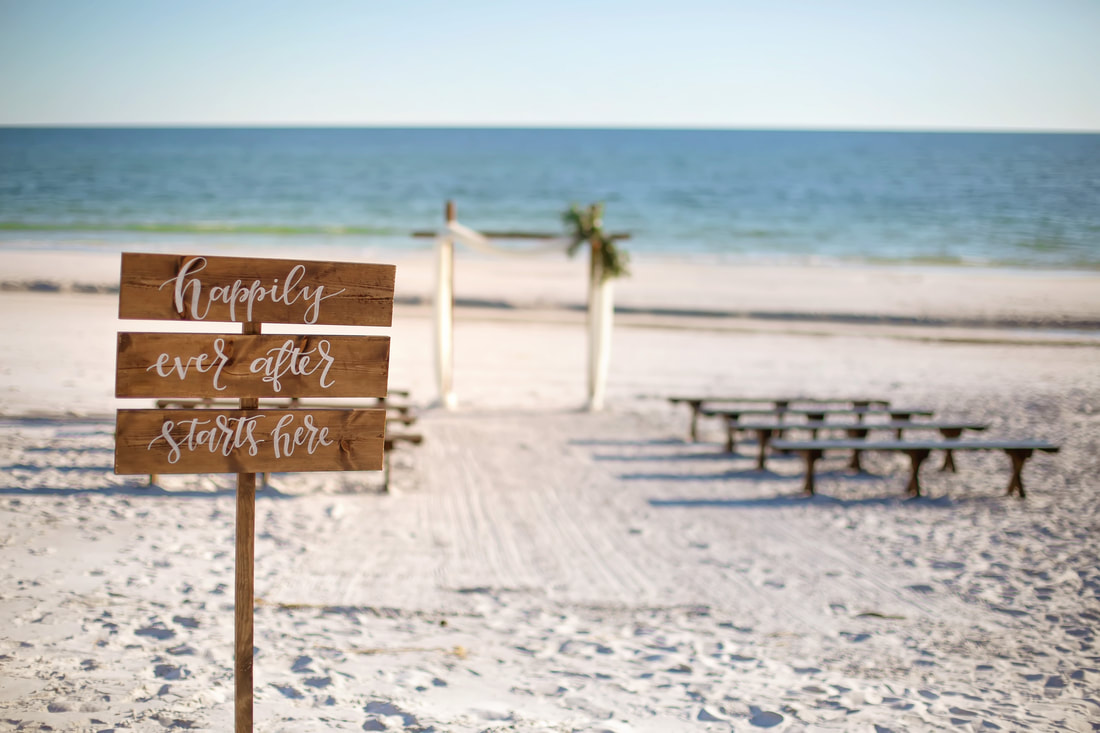 sign for wedding ceremony site on 30a beach. santa rosa beach photographer. 